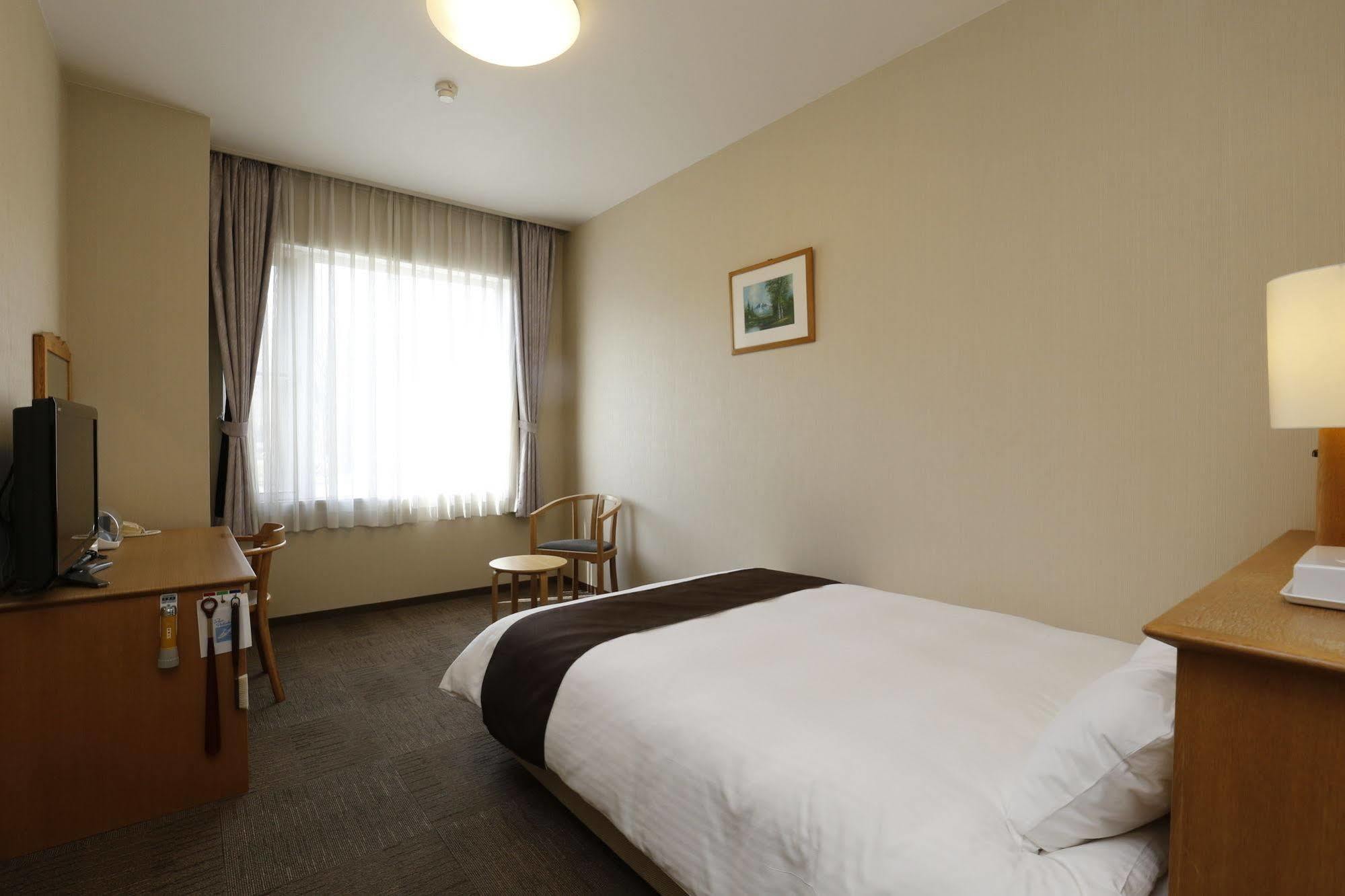 Shintoku Yuyado Kuttari Onsen Lake Inn מראה חיצוני תמונה